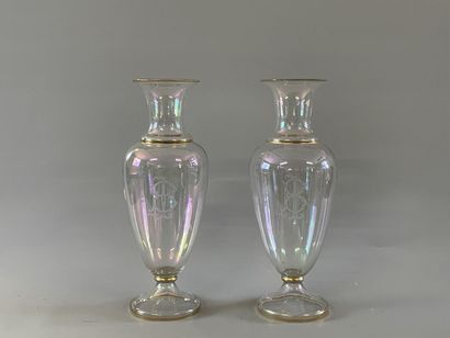 Pair of iridescent translucent glass vases...
