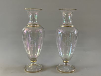 Pair of iridescent translucent glass vases...