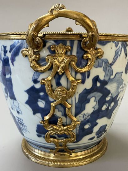 Old vase transformed into a pot holder in...