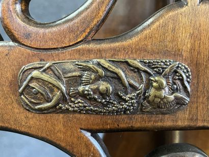 Mahogany japanese showcase, topped by a carved...
