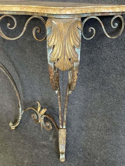 Wrought iron console with marble top.

Louis...