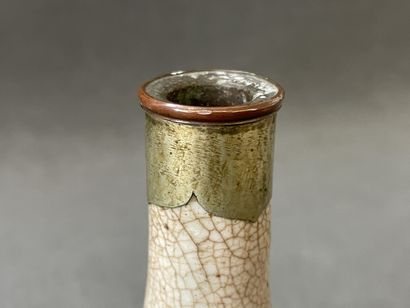 Bottle and covered pot in enamelled stoneware.

H....