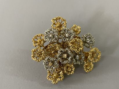 Brooch in gold 750°/00 with flowers 

Weight:...