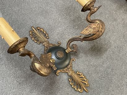 Five ormolu and patinated sconces decorated...