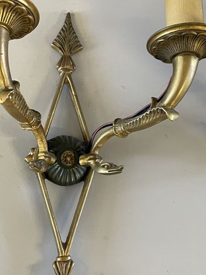 Pair of ormolu and patinated sconces decorated...