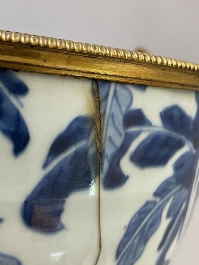 Old vase transformed into a pot holder in...