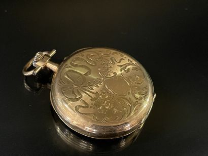 
Pocket watch in gold 750°/00, engraved decoration...