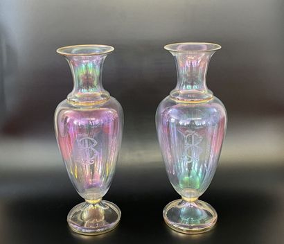 Pair of iridescent translucent glass vases...