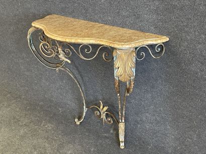 Wrought iron console with marble top.

Louis...