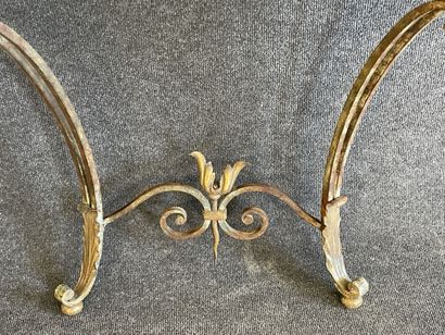 Wrought iron console with marble top.

Louis...