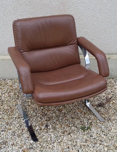 Large armchair with chromed metal base and...