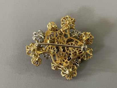 Brooch in gold 750°/00 with flowers 

Weight:...