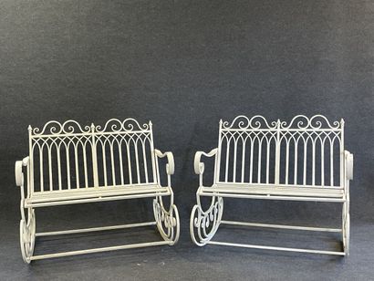 Pair of rocking garden benches in curved...