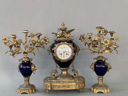 Gilded bronze and blue porcelain mantel set...