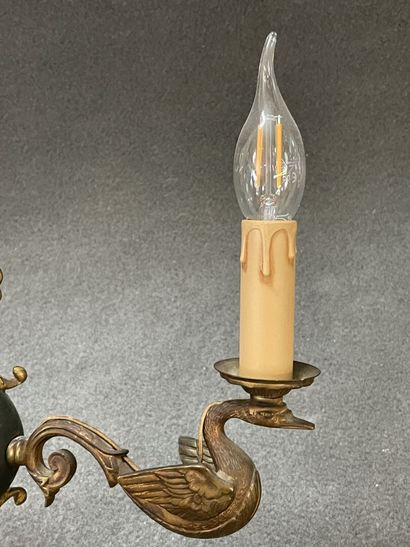 Five ormolu and patinated sconces decorated...