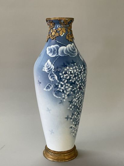 Large porcelain vase decorated with blue...