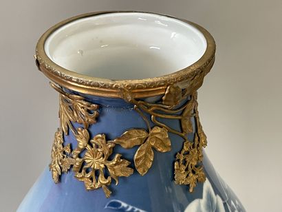 Large porcelain vase decorated with blue...