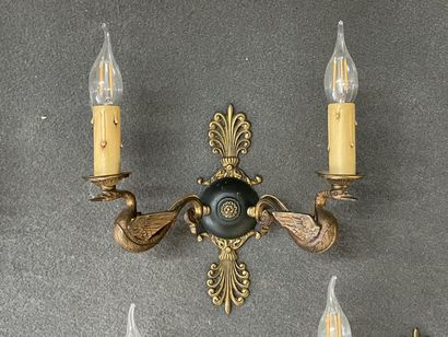 Five ormolu and patinated sconces decorated...
