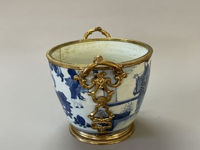 Old vase transformed into a pot holder in...