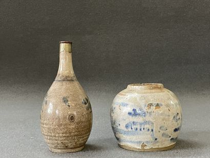 Bottle and covered pot in enamelled stoneware.

H....