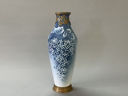 Large porcelain vase decorated with blue...