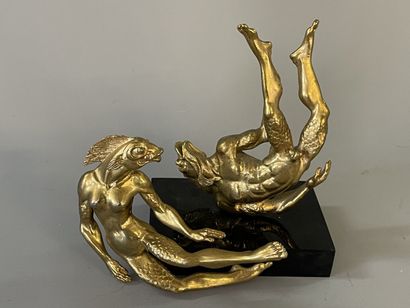 Couple of anthropomorphic fish

Gilded bronze...