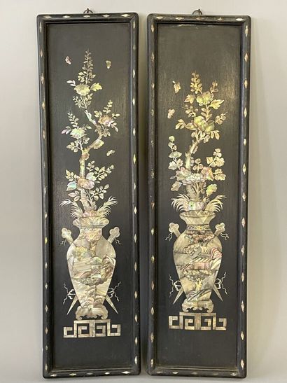 Pair of blackened wood plates with rich mother-of-pearl

representing...
