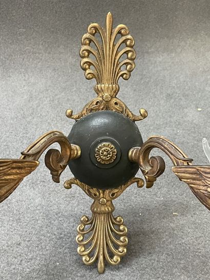 Five ormolu and patinated sconces decorated...
