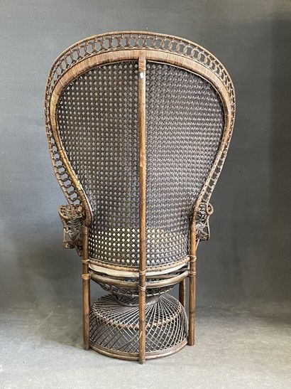 Pair of wicker armchairs with high rounded...