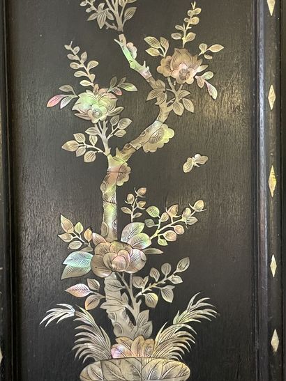 Pair of blackened wood plates with rich mother-of-pearl

representing...