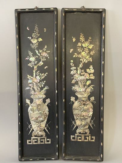 Pair of blackened wood plates with rich mother-of-pearl

representing...