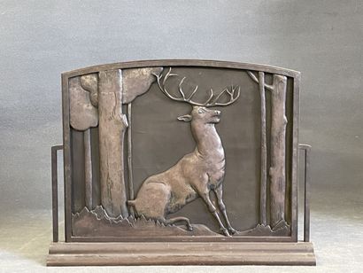 Fireguard in patinated metal representing...