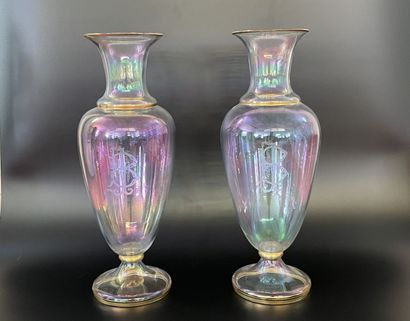 Pair of iridescent translucent glass vases...
