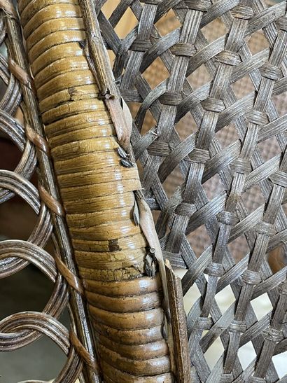 Pair of wicker armchairs with high rounded...