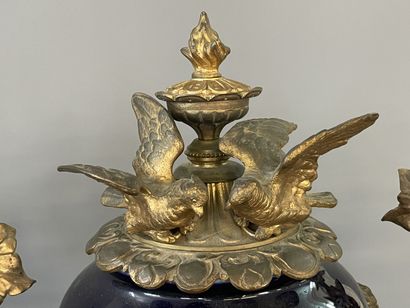 Gilded bronze and blue porcelain mantel set...