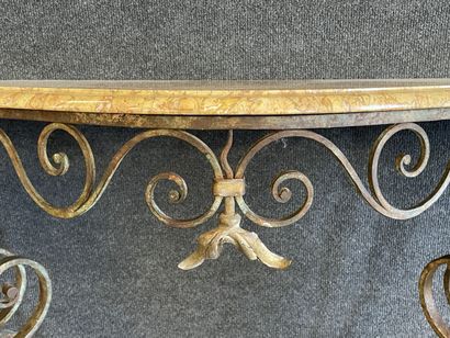 Wrought iron console with marble top.

Louis...