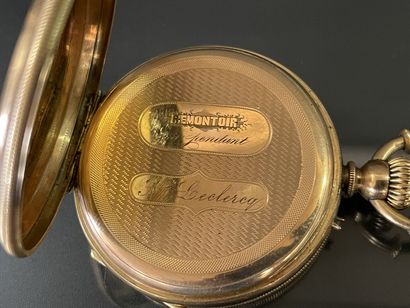 
Gold pocket watch with dust cover.




...