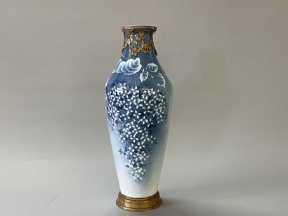 Large porcelain vase decorated with blue...