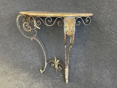 Wrought iron console with marble top.

Louis...