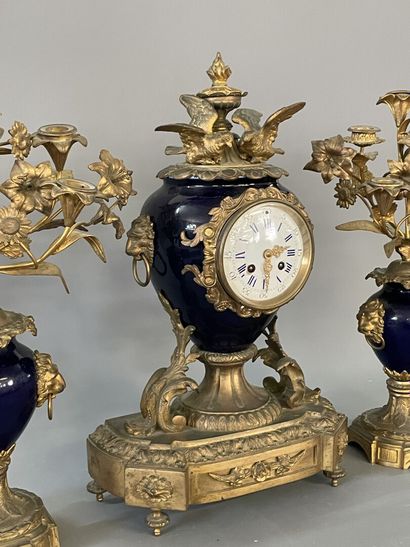 Gilded bronze and blue porcelain mantel set...
