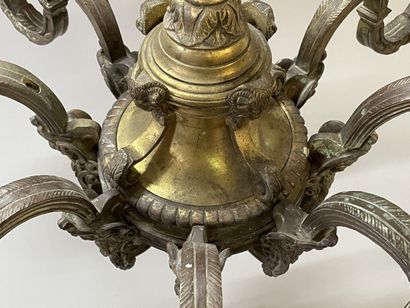 Bronze chandelier with eight lights.

Regency...
