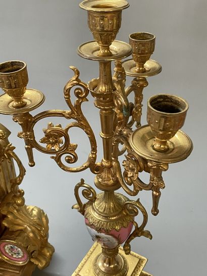 Gilt bronze and porcelain plate mantelpiece....