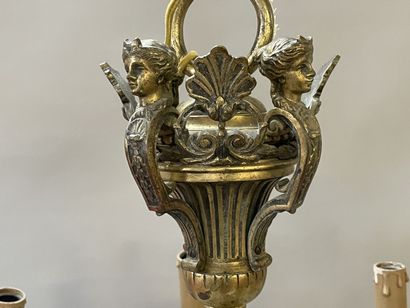 Bronze chandelier with eight lights.

Regency...