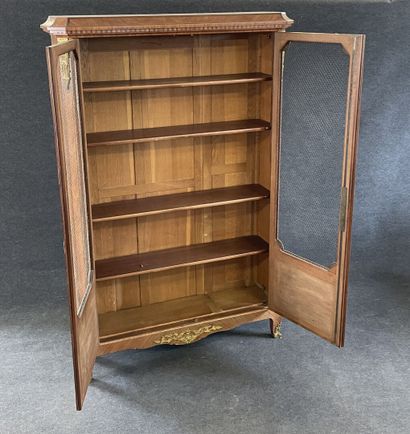Walnut frieze display case, opening with...