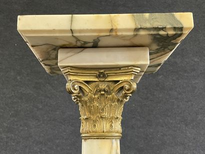Marble and bronze column with swivel top....