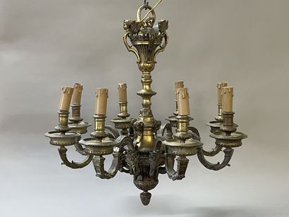 Bronze chandelier with eight lights.

Regency...