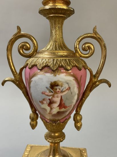 Gilt bronze and porcelain plate mantelpiece....