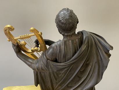 Antique poet clock, in patinated bronze and...