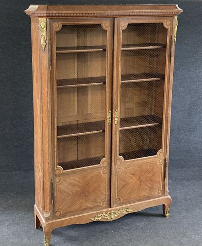 Walnut frieze display case, opening with...