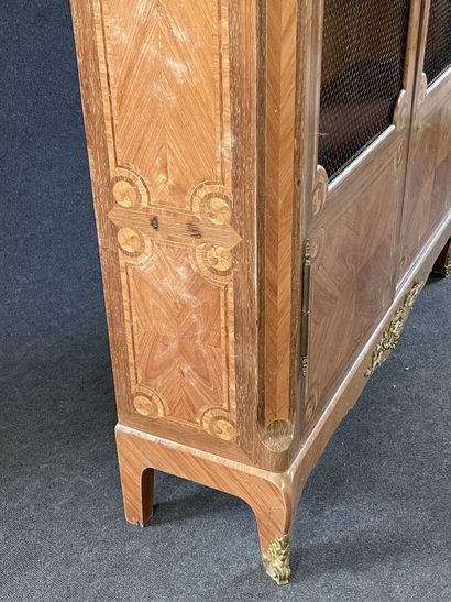 Walnut frieze display case, opening with...